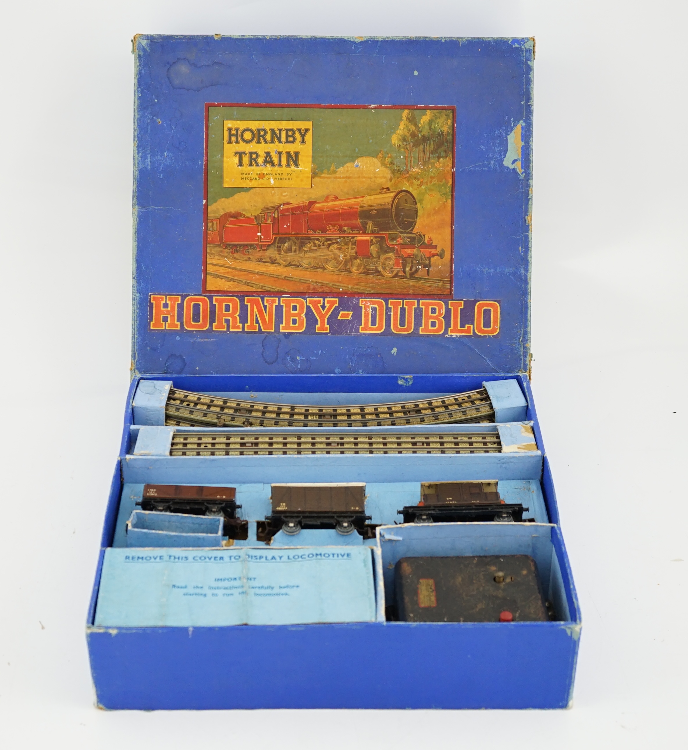 A boxed Hornby Dublo EDG7 Southern Railway Tank Goods Set, comprising of an SR Class N2 0-6-2T locomotive, 2594, for 3-rail running, two Southern freight wagons and an associated LMS open wagon, track sections, etc.